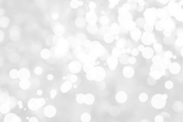 Abstract background with White bokeh on gray background. christmas blurred beautiful shiny Christmas lights.