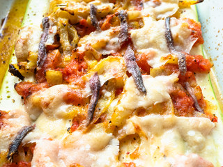 Zucchini squash baked with vegetables in dish