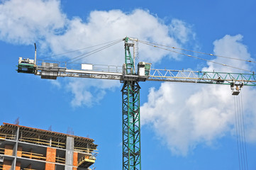 Crane and highrise construction site