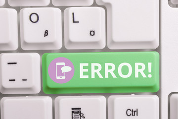 Writing note showing Error. Business concept for state or condition of being wrong in conduct judgement or program Keyboard with note paper on white background key copy space