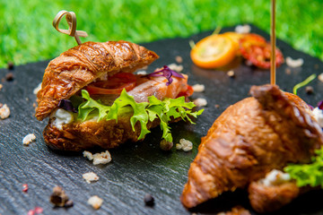 Croissant With Salmon And Greens