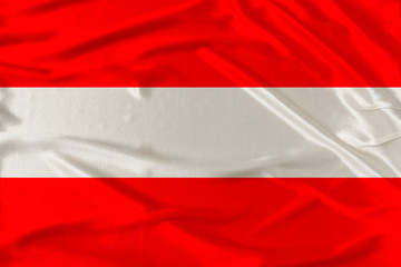 national flag of Austria on delicate silk with wind folds, travel concept, immigration, politics