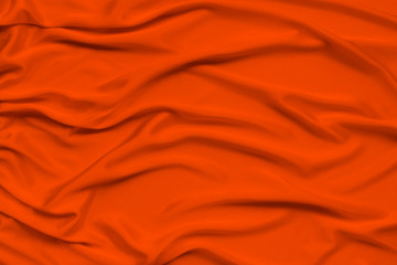 silk knitted fabric softly draped with small folds, texture, background, form for postcard, copy...