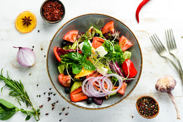 Fresh vegetable salad with feta cheese. Food. Top view. Free space for your text.