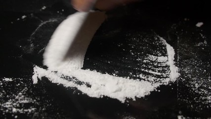 Man preparing drugs for snoring. Cocaine inhaled. Drugs addicted.