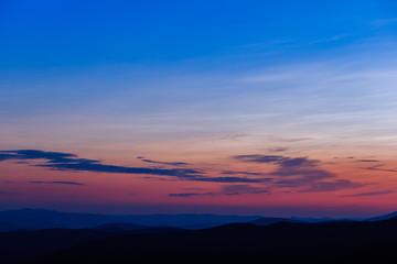 Fototapeta na wymiar Colorful sunset over the mountain hills. Location place Carpathians, Borzhava ridge.