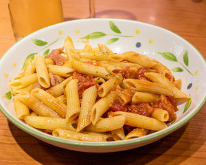 Pasta alfredo penne with tomato based sauce