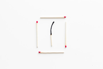 Matches for danger concept on white background top view