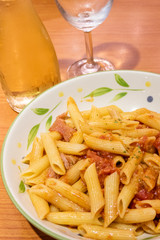 Pasta alfredo penne with tomato based sauce