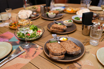 Different meals for the guests on the restaurant table