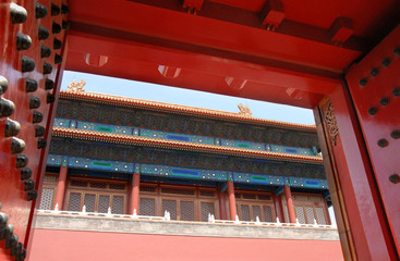 Forbidden City, Beijing, China. Looking through a gate inside the Forbidden City. The Forbidden City has traditional Chinese architecture. The Forbidden City is also the Palace Museum, Beijing, China.