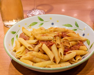Pasta alfredo penne with tomato based sauce