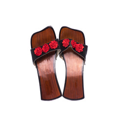 wooden women's shoes Isolated on a white background