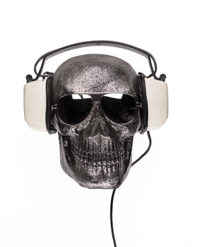 skull in headphones on a white background