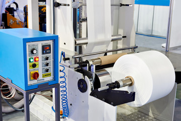 Machine for production of plastic bags