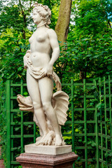 Allegorical sculpture of Beauty in old city park "Summer garden" in St. Petersburg, Russia