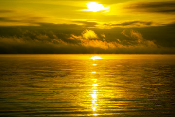 dawn on the lake in the fog