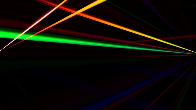 Glowing rays motion. Disco lights. Neon pink green illuminated lines.