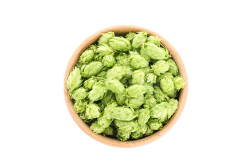 Wooden bowl with hop cones isolated on white background