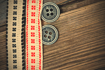 vintage bands with embroidered ornaments and old buttons