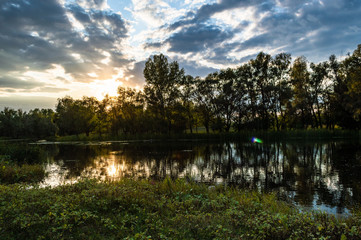 Fototapeta na wymiar Beautiful landscape sunset on the lake