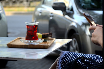 Turkish tea on a table in an outdoor cafe,