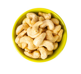 cashew nuts in a bowl isolated on white background