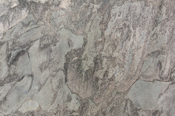 Beautiful old colored sedimentary rock texture closeup