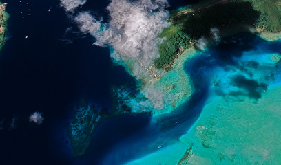 Landscape of the coast of the resort island of Bora Bora from a bird's eye view