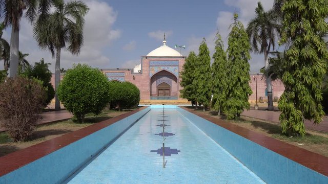 Thatta Shah Jahan Mosque Frontal View with Empty Fountain Trees and Bushes on a Sunny Blue Sky Day