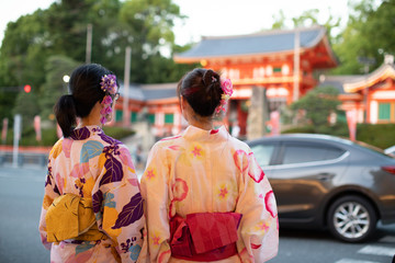 2 girls in yukata near Yasaka Shrine, once called Gion Shrine is a Shinto shrine in the Gion...