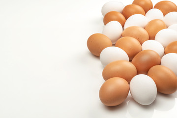 Fresh farm eggs. Brown and white colored fresh eggs