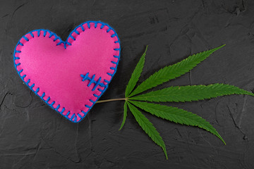 Handmade colorful felt heart with marijuana leaf