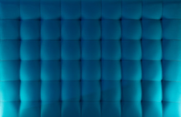 Fototapeta premium Pattern of a blue cloth upholstered headboard