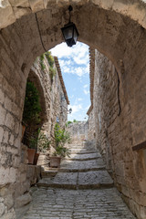 arch door entrance in Lacoste small typical village in Provence France