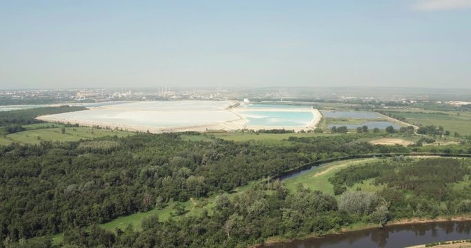 The largest factory in the world of baking soda (bicarbonate) / big blue reservoir - Aerial drone view