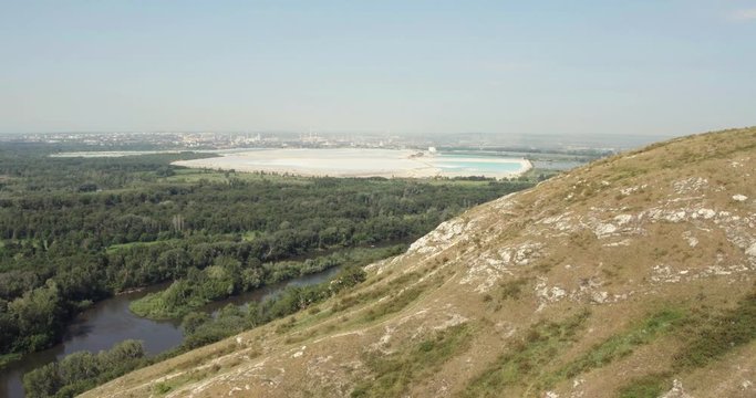 The largest factory in the world of baking soda (bicarbonate) / big blue reservoir - Aerial drone view