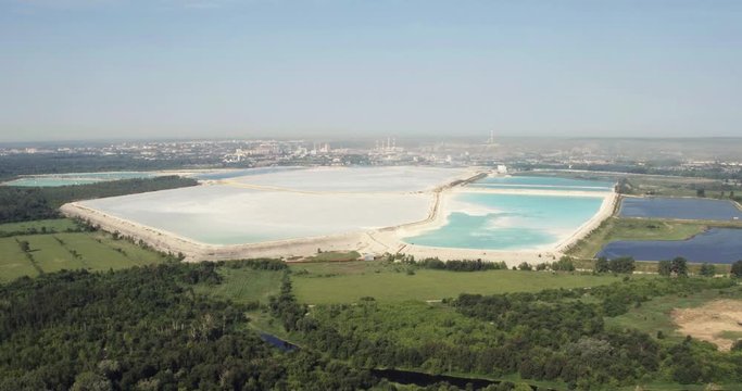 The largest factory in the world of baking soda (bicarbonate) / big blue reservoir - Aerial drone view