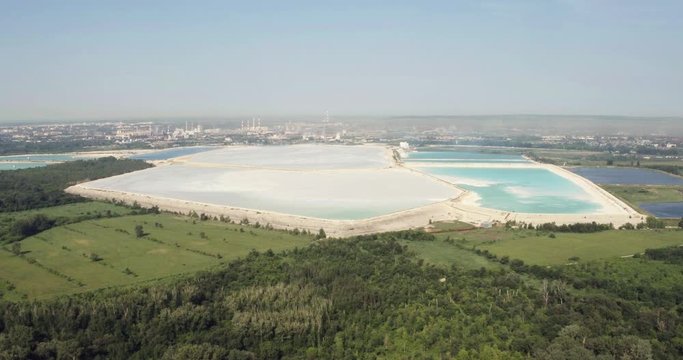 The largest factory in the world of baking soda (bicarbonate) / big blue reservoir - Aerial drone view