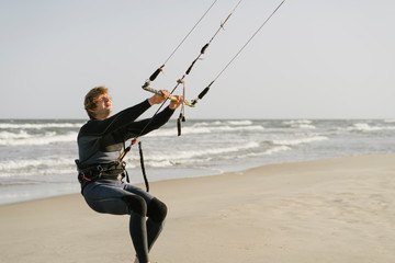 Kiteboarder preparing his kite