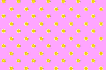 Seamless pattern of fresh lemon round cut on pink