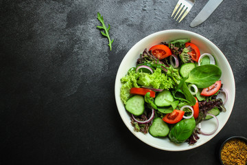 Healthy salad, leaves mix salad (mix micro greens, cucumber, tomato, onion, other ingredients)....