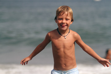 Happy little boy on the Beach