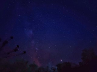 Fototapeta na wymiar night sky with stars and clouds