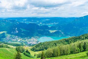 Fototapeta na wymiar View of St.Gilgen village, Wolfgangsee lake and surrounding mountains from Zwolferhorn mountain in Salzkammergut region, Austria