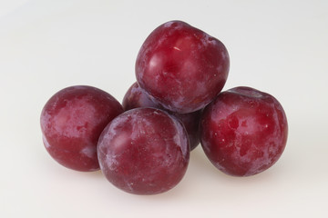 Sweet ripe plum isolated on white
