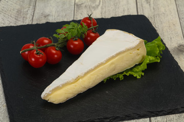 Brie cheese triangle served salad