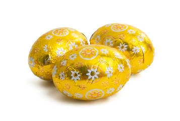 chocolate eggs in foil isolated