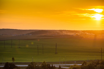 Naklejka na ściany i meble European countryside scenery during sunset.