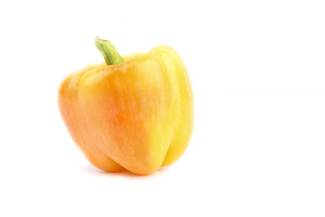 Fresh orange sweet pepper isolated on white background.